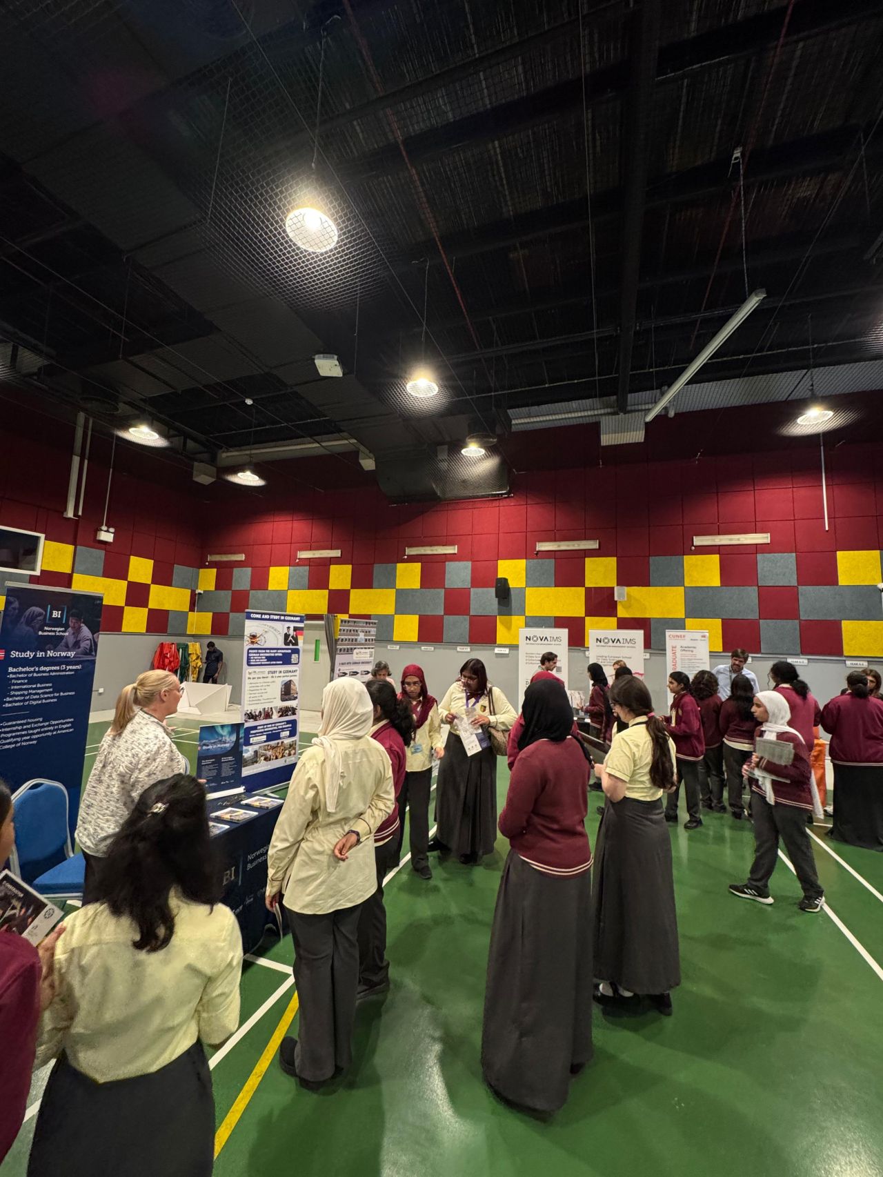 Crowd of students engaging across the fair floor